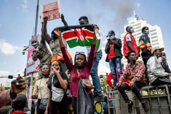 A protester in Nairobi, Kenya, holds a Kenyan flag during a nationwide demonstration on 25 June 2024.